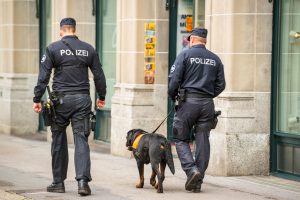 Policemen with dog on Zurich street, Switzerland